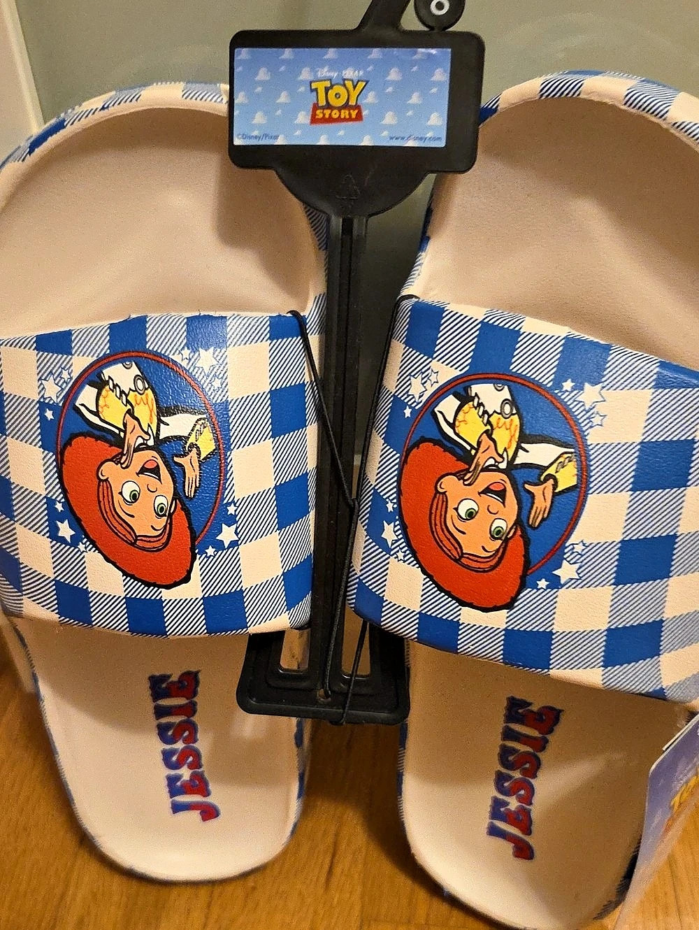 Disney Toy Story Jessie Blue Checkered Slide Sandals & White Sandals Womams
Size